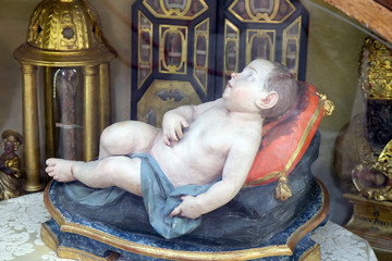 Baby Jesus figure in San Petronio Basilica in Bologna, Italy