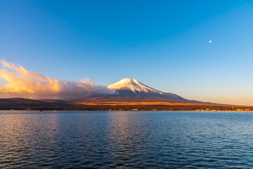 Fujisan or Fuji mountain in sunrise light at lake Yamanaka, Yamanashi prefecture Japan.