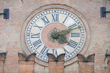 Fototapeta na wymiar Old Clock from Palazzo d'Accursio (Palazzo Comunale) in Bologna, Italy