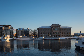 Fototapeta premium View over boats and islands in Stockholm a winter day in winter solstice 