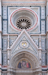 Obraz premium Charity among the founders of Florentine philanthropic institutions, Left Portal of Cattedrale di Santa Maria del Fiore (Cathedral of Saint Mary of the Flower), Florence, Italy 