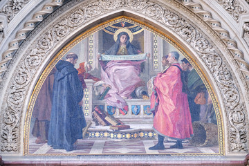 Obraz premium Charity among the founders of Florentine philanthropic institutions, Left Portal of Cattedrale di Santa Maria del Fiore, Florence, Italy 