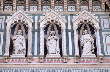 Statues of the Apostles and the fine architectural detail of the of the, Portal of Cattedrale di Santa Maria del Fiore (Cathedral of Saint Mary of the Flower), Florence, Italy