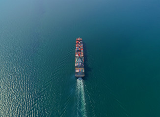Aerial view container ship at the sea full load container for logistic, import export, shipping or...