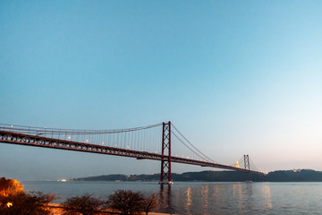 Fototapeta na wymiar 25 april bridge landscape in Lisbon, Portugal