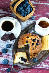 Blueberry muffin and coffee