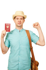 The man with the international passport, holds a fist, gesture - good luck wish, farewell, parting