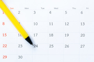 close up of calendar and pen on the table, planning for business meeting or travel planning concept