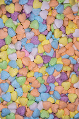 Fototapeta na wymiar candy, love hart colorful closeup with background