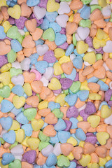 Fototapeta na wymiar candy, love hart colorful closeup with background