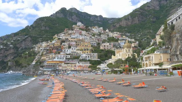 View of Positano, Italy. Positano is a village and commune on the Amalfi Coast (Costiera Amalfitana), in Campania, Italy, mainly in an enclave in the hills leading down to the coast.