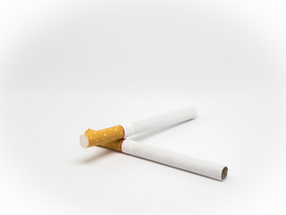 two brown cigarette on isolated white background