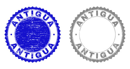 Grunge ANTIGUA stamp seals isolated on a white background. Rosette seals with grunge texture in blue and gray colors. Vector rubber watermark of ANTIGUA label inside round rosette.