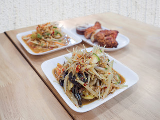 Famous spicy green papaya salad in Thailand traditional food, it's called Som Tum