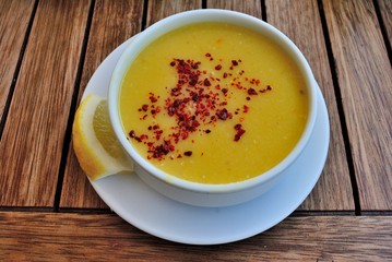 Turkish lentil soup topped with dried chili pepper flakes