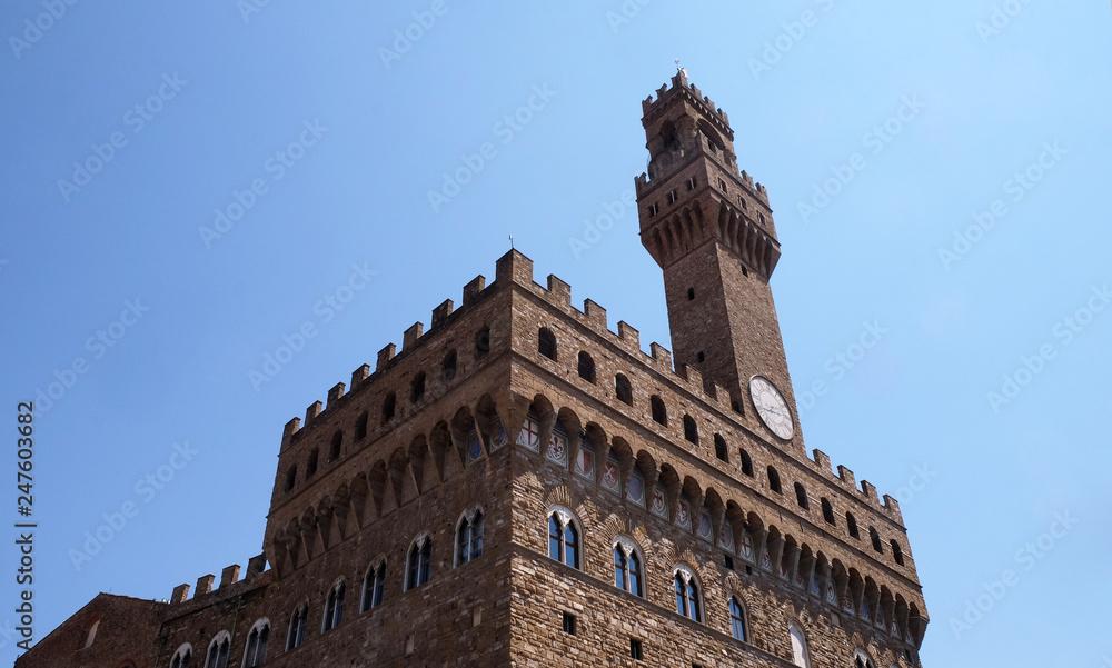 Wall mural The Palazzo Vecchio (Old Palace) a Massive Romanesque Fortress Palace, is the Town Hall of Florence, Italy 