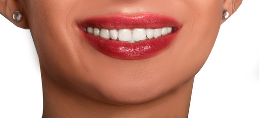 Obraz premium smile of young woman with white teeth and cherry lipstick 