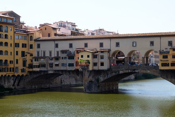 Medieval stone bridge Ponte Vecchio and the Arno Rive in Florence, Tuscany, Italy