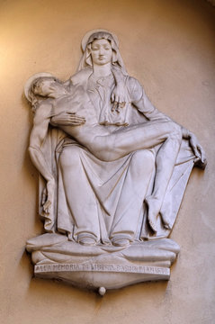 Pieta, Statue On The House Facade In Florence, Italy