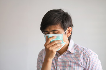 Asian man using the medical face mask