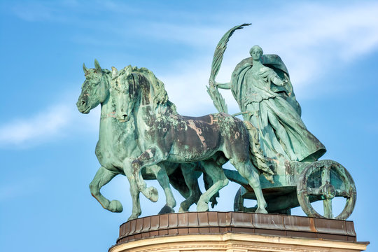 Female statue of peace riding a chariot at Heroes Square (Hosok Tere),one of the major squares in Budapest. Hungary