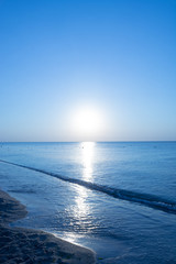 The list, beach, sea, dawn, sun,Dawn of the sun in the sea calm sea water landscape