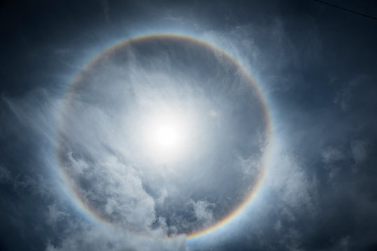 Wonderful solar halo with fluffy clouds, Sunny and holar
