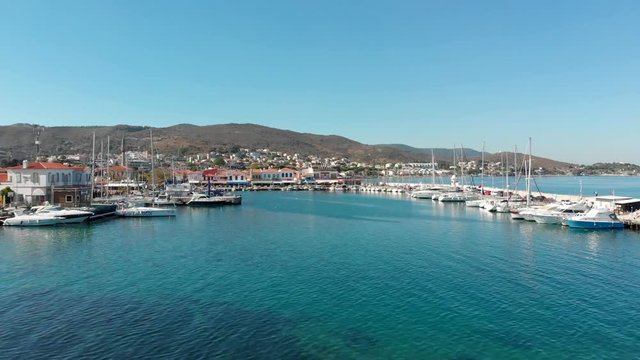 Various drone shots in beautiful Urla, Izmir - the third largest city in Turkey. Blue waters of the Aegean Sea, seagulls and sailboats on a sunny summer morning/afternoon.
