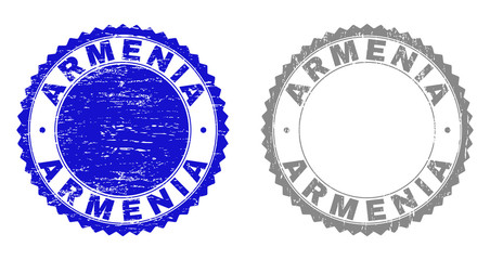 Grunge ARMENIA stamp seals isolated on a white background. Rosette seals with grunge texture in blue and grey colors. Vector rubber watermark of ARMENIA caption inside round rosette.