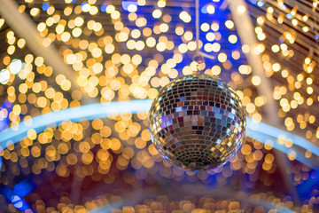 Christmas disco ball decorating on branch fir of Christmas tree and Christmas ornament.