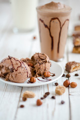 ICED COFFEE IN GLASSES WITH CREAM AND NUTS