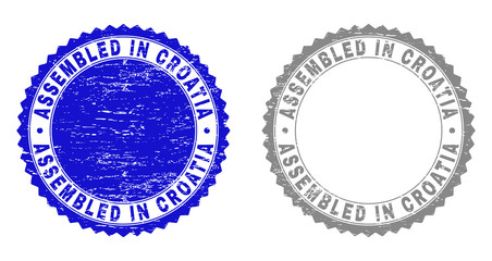 Grunge ASSEMBLED IN CROATIA stamp seals isolated on a white background. Rosette seals with grunge texture in blue and gray colors.