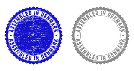 Grunge ASSEMBLED IN DENMARK stamp seals isolated on a white background. Rosette seals with grunge texture in blue and gray colors.