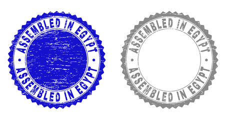Grunge ASSEMBLED IN EGYPT stamp seals isolated on a white background. Rosette seals with distress texture in blue and grey colors.