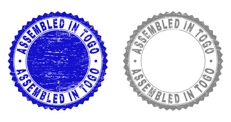 Grunge ASSEMBLED IN TOGO stamp seals isolated on a white background. Rosette seals with grunge texture in blue and grey colors. Vector rubber overlay of ASSEMBLED IN TOGO title inside round rosette.