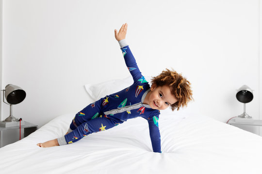 Boy in side plank position