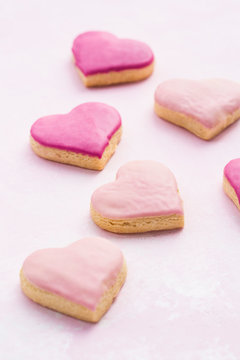 Heart shaped cookies with pink frosting