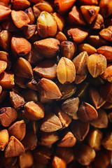 Buckwheat grains are dry brown, texture is macro