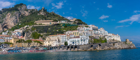 View of beach and old buildings of  Amalfi town at Amalfi coast, Italy.
