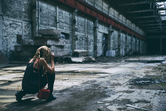 Photographer  in an abandoned building