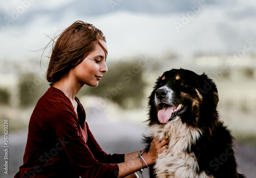 Woman Petting Her Dog Stock Photo And Royalty Free Images On