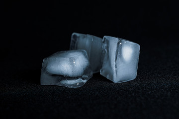 ice cubes on black background