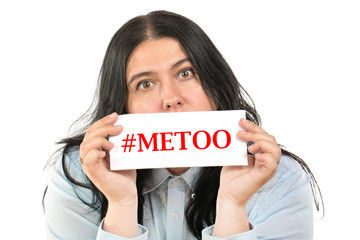 Me Too movement. Sad beautiful caucasian brunette woman holds a banner with the inscription metoo isolated on white background.