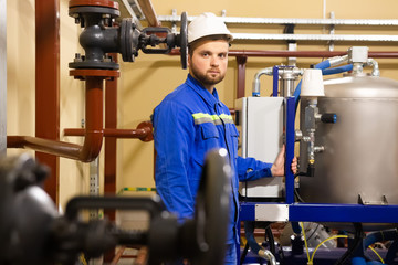 Technician worker on gas and oil refinery plant.