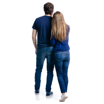 Man and woman hold hands on white background isolation, back view