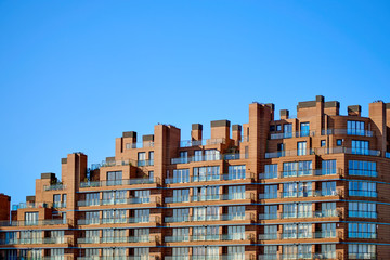 Modern Building With Irregular Roof over Blue Sky