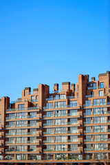 Modern Building With Irregular Roof over Blue Sky