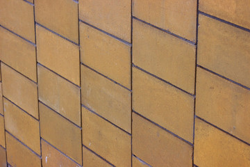 aged wall made of red bricks. Vintage red brick wall with lovely texture. Different sizes bricks. Flatlay, background or texture