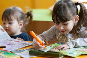 Little girls having fun at school