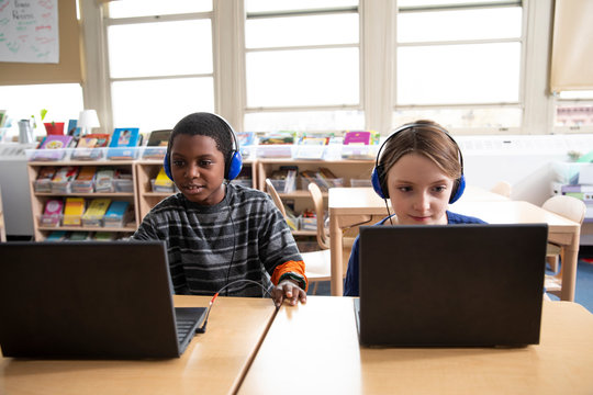 Students working on laptop computers